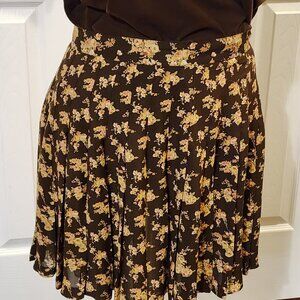 Banana Republic pleated skirt in a coffee color with yellow & peach flowers